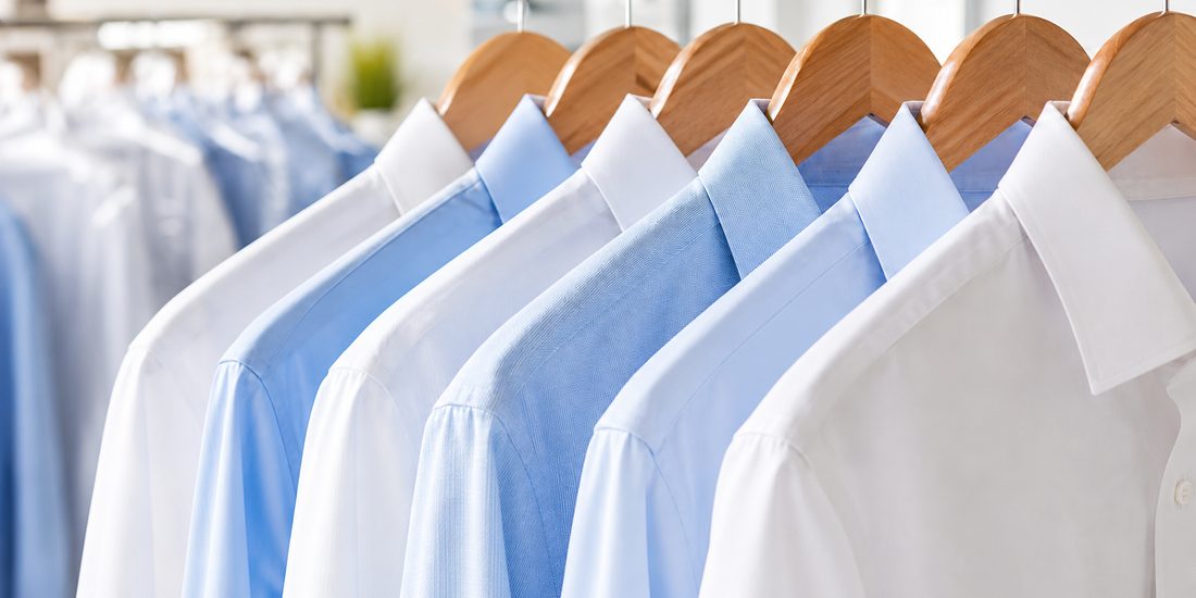 Laundered and pressed dress shirts on hangers, shirt laundry Rockville MD